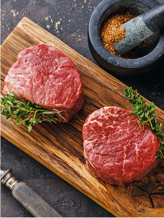 Steaks on a cutting board